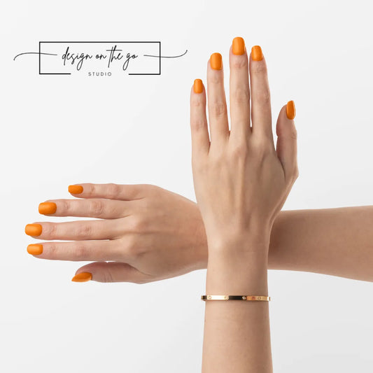 #type_manicure two hands with manicured nails that have nail wraps applied