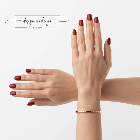 #type_manicure two hands with manicured nails that have nail wraps applied