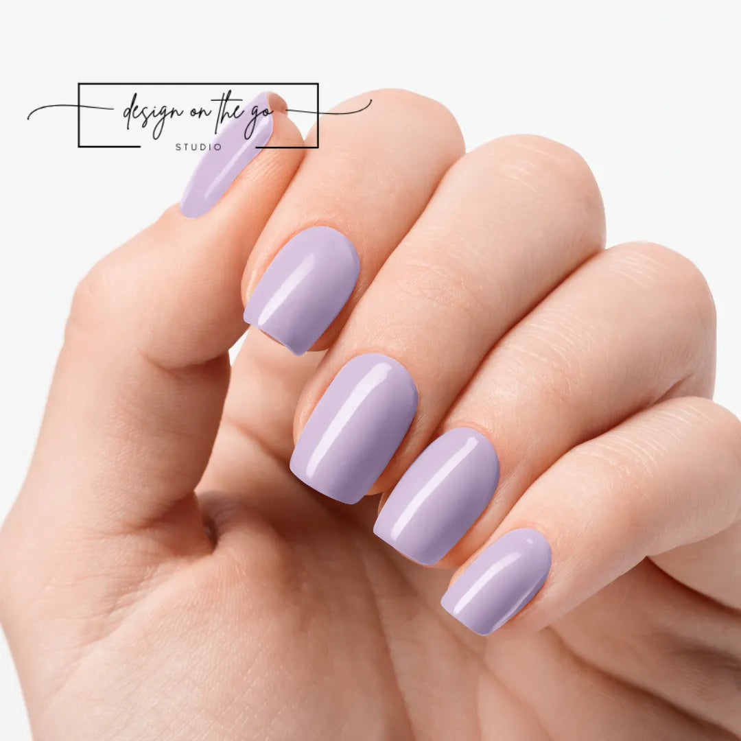 #type_manicure one hand showing beautifully manicured nail with nail wraps applied on white background