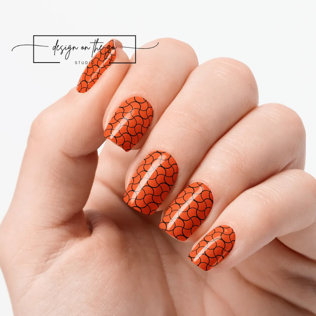 #type_manicure one hand showing beautifully manicured nail with nail wraps applied on white background