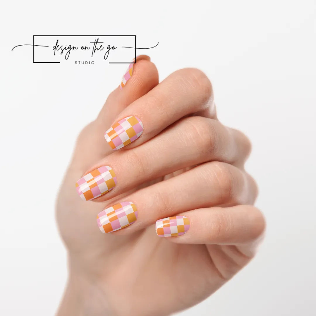 #type_manicure one hand showing beautifully manicured nail with nail wraps applied on white background