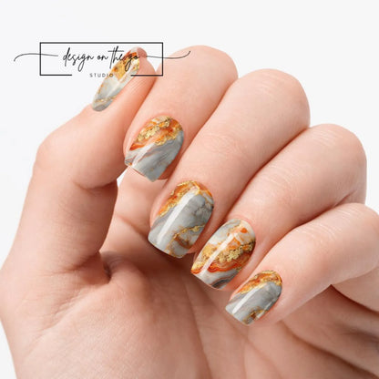 Nail art with marble design on a white background