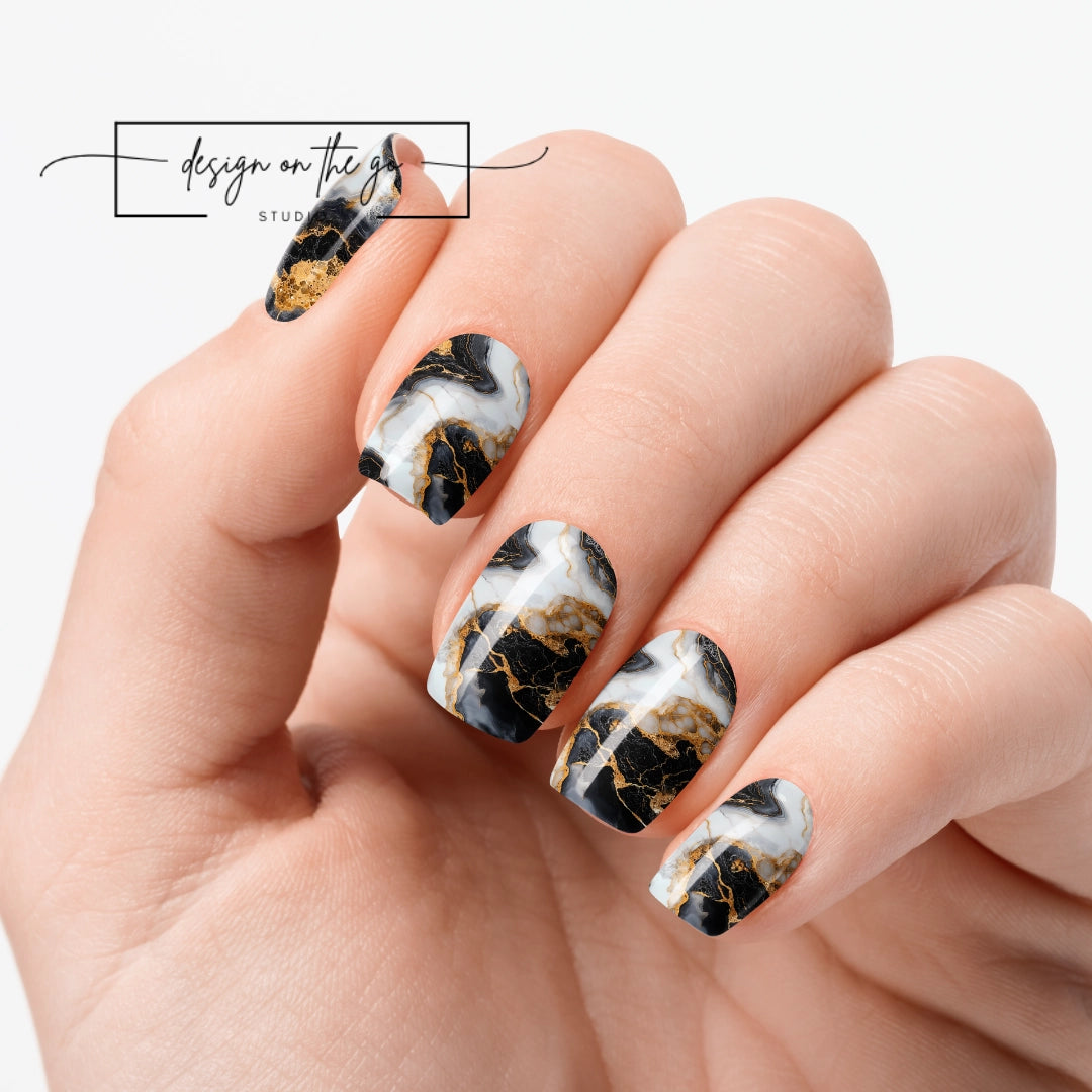#type_manicure one hand showing beautifully manicured nail with nail wraps applied on white background