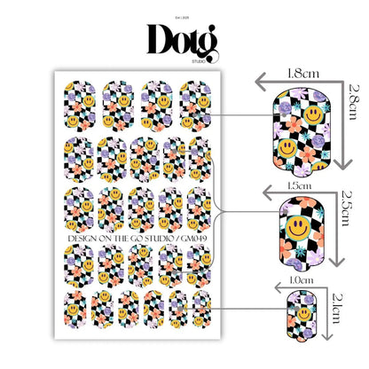 Sheet of colourful nail art nail wraps with smiley faces and checkered patterns.